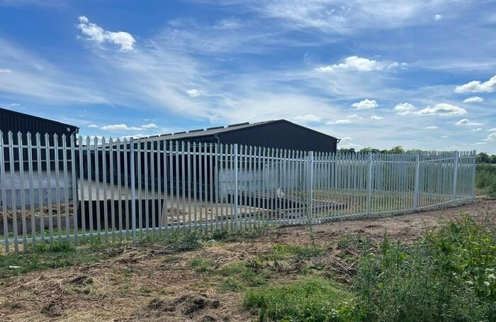 Palisade fencing for a farm in Benson